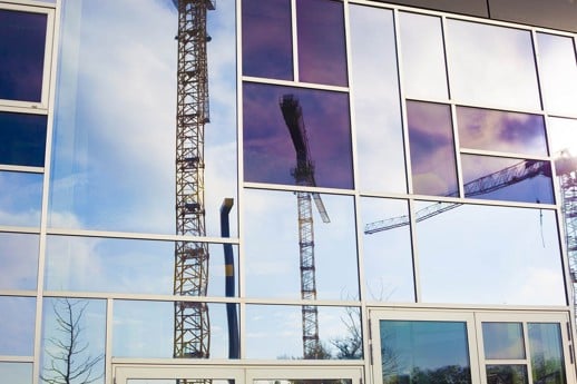 Two years of the Quality Assurance (Building Sector) Act: initial experiences in construction and development practice